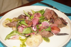 Adobo Spiced Flank Steak with green banana escabeche, radish salad & a chimichurri sauce