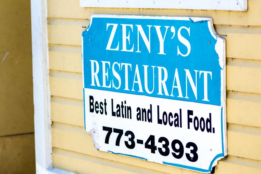 Zeny's Restaurant sign on building